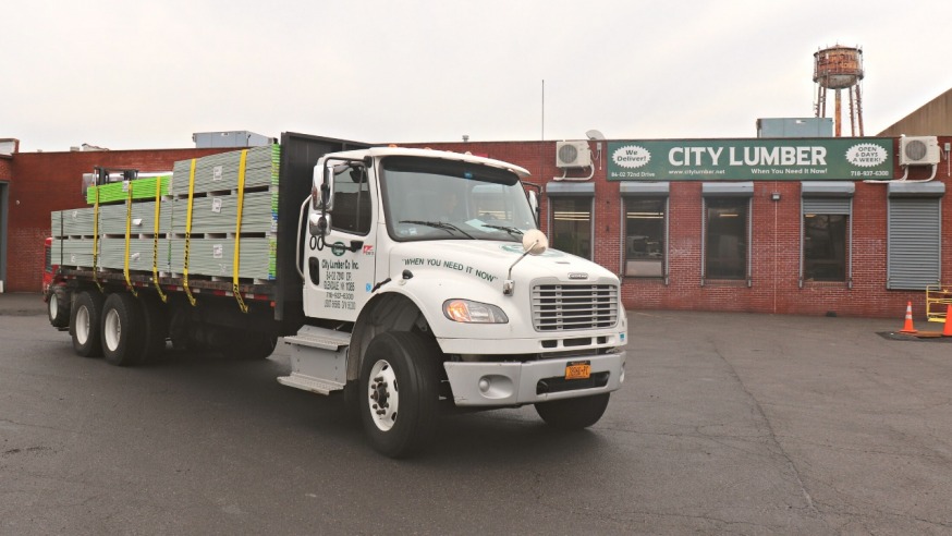 A loaded truck about to leave City Lumber (Photo: Michael Dorgan, Queens Post)