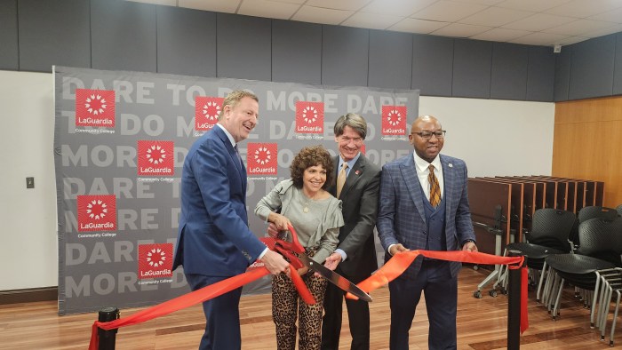 Former Mayor Bill de Blasio, Inner Circle President Samantha Lieberman, LaGuardia President Kenneth Adams and Queens Borough President Donovan Richards at a ribbon-cutting ceremony for LaGuardia Community College's new Inner Circle archive collection on Thursday. Photo: Shane O'Brien