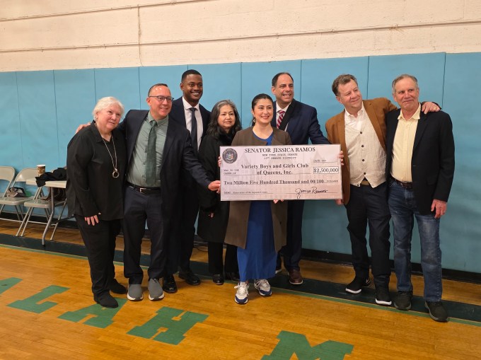 State Sen. Jessica Ramos, Costa Constantinides and Variety Boys and Girls Club board members pose with $2.5 million check for organization's new swimming pool. Also pictured is Ramos's mother. Photo: Shane O'Brien