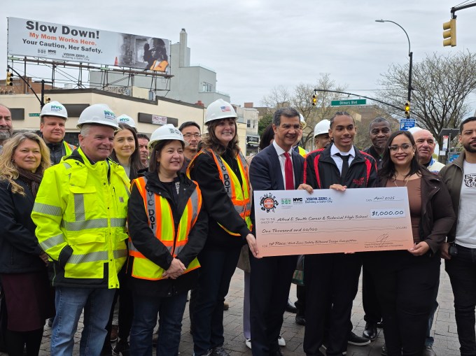DOT officials present Mendez and his school with a check for $1,000. Photo: Shane O'Brien