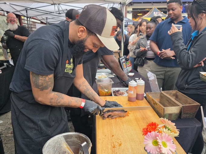 Guests line up for Brisket at the annual Brisket King NYC cook-off at Pig Beach BBQ. Photo: Shane O'Brien