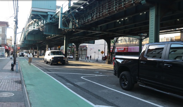 DOT proposal image for 31st Street, showcasing protected bicycle lanes and floating parking spaces. Via Change.org