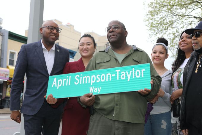 From left: Queens Borough President Donovan Richards, Council Member Julie Won, Daniel Lee Taylor, the husband of the late April Simpson-Taylor, and family members. (Credit: Alex Krales/NYC Council Media Unit)